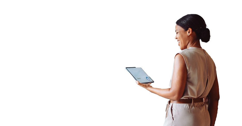 Confident businesswoman presenting to colleagues in a modern office setting. She is holding a digital tablet showing graphs and data, while colleagues are engaged and attentive.
