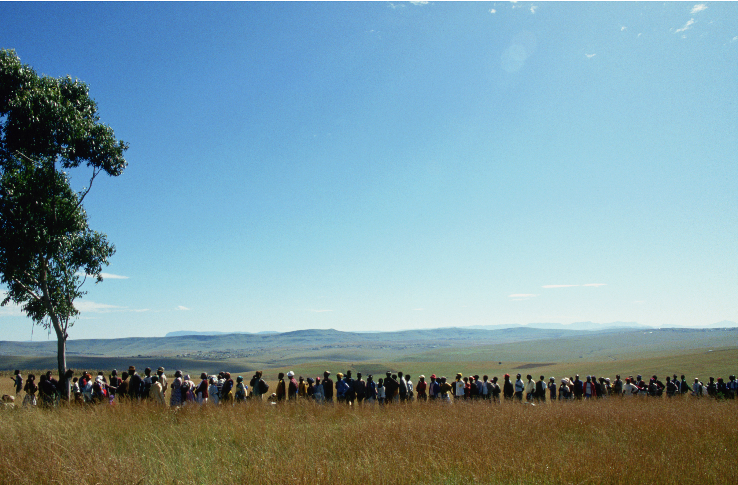 A long line of people waiting to vote in Nelson Mandela's native village of Transkei. 1994 was the first time black South Africans were allowed to vote in elections.  (Photo by Peter Turnley/Corbis/VCG via Getty Images)